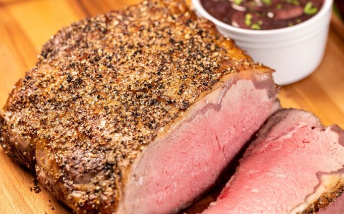 Green Peppercorn Crusted Strip Roast with Red Wine Sauce