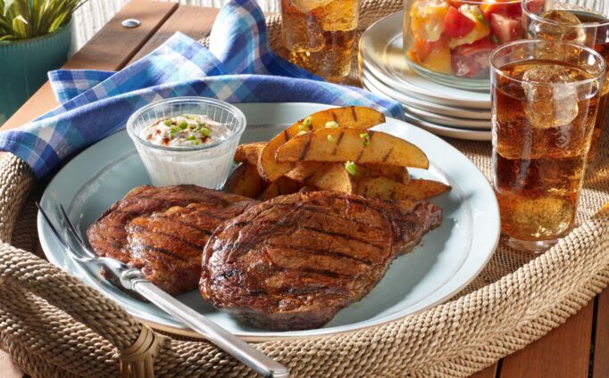 Grilled Ribeye Steaks and Potatoes with Smoky Paprika Rub